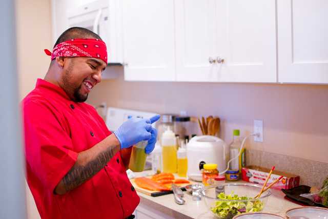 Arturo Ramos preparing a salad