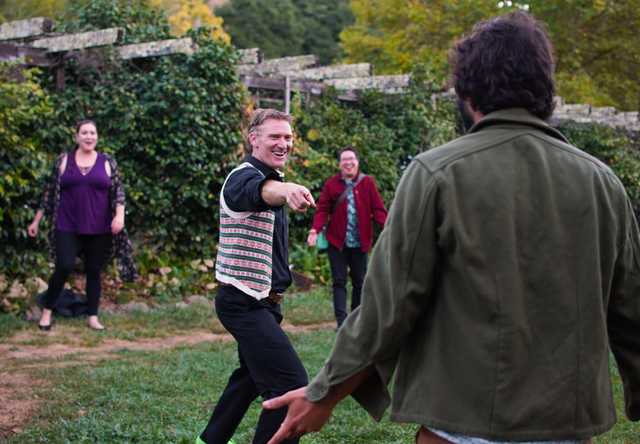 People playing an ice breaker game.